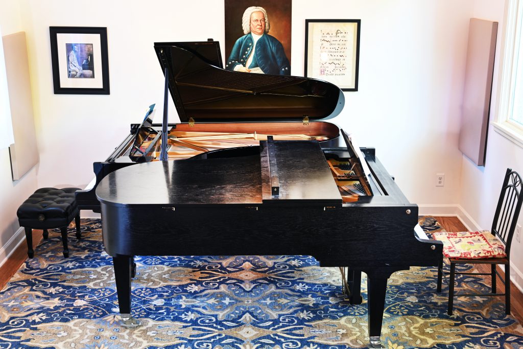 Two grand pianos, Steinway B, and Schimmel. 